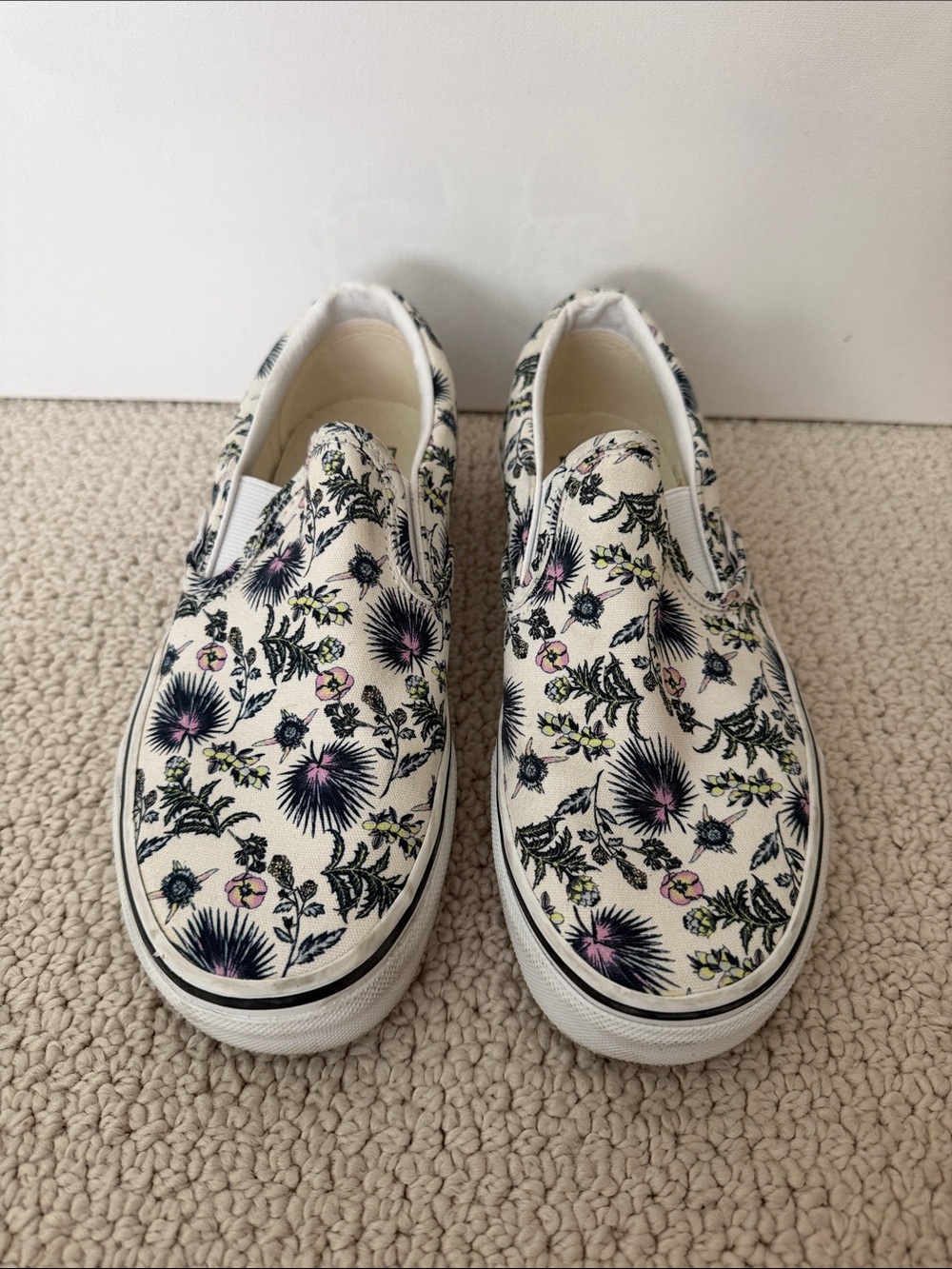 Vans women’s Floral Slip-On Sneakers in Cream, Black and Pink